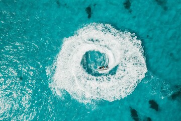 Aerial view of a person on a jet ski