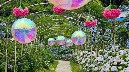 Decorated garden pathway with flowers and balloons