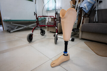 Prosthetic leg and walker in rehabilitation center room