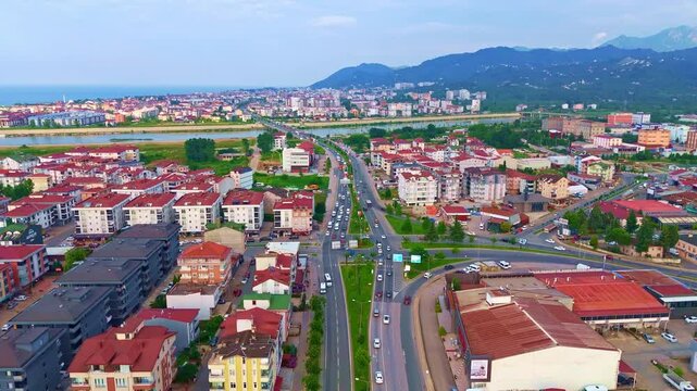 Aerial view a city with a river.
