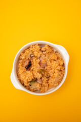 traditional portuguese dish rice with seafood in white dish