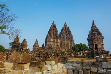 Fototapeta premium Ancient temple ruins of Prambanan (Candi Prambanan) a 9th-century Mahayana Buddhist temple complex in Magelang Regency, Yogyakarta region, central Java, Indonesia