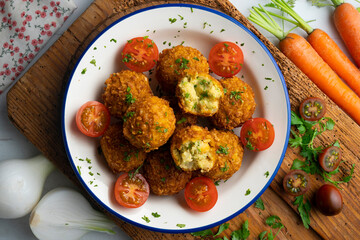 Vegan Chickpea balls coated with panko. Top view table.