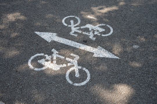 Detail of the traffic sign on the ground indicating bike lane in the city of Barcelona