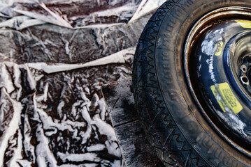 Removing rust from car parts using angle grinder. Car body corrosion.
