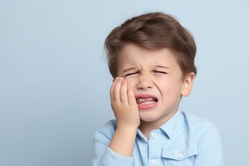 Child with toothache pain expression