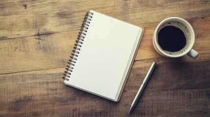 Office desk with a blank notepad, pen, and a cup of coffee, waiting for a business plan to be written. -