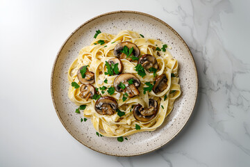 Creamy Tagliatelle Pasta with sliced brown mushrooms, garlic and parsley dish on table top view