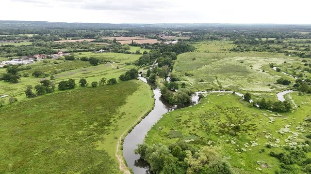 the Wey Navigation winds through the Surrey countryside at Ripley on a sunny day in England
