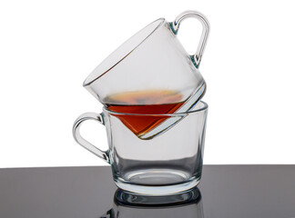 transparent cup of tea in a cup on a light background