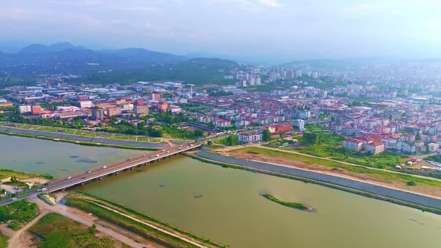 Aerial view a city with a river.