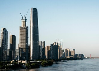 Panoramic view of a modern city skyline with high-rise buildings .