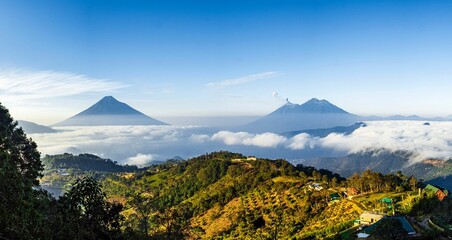 Obraz premium Volcanos and clouds early morning light landscape