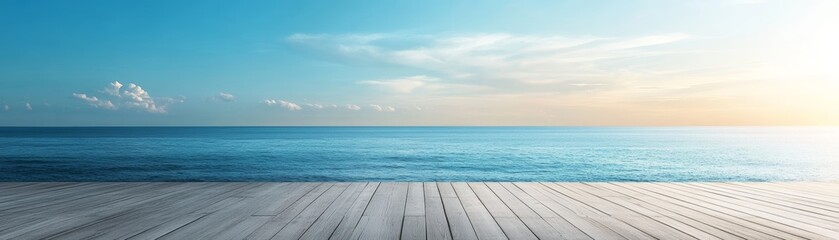 Obraz premium A serene beach scene with gentle waves, clear skies, and a beautiful horizon at sunrise, perfect for relaxation and inspiration.
