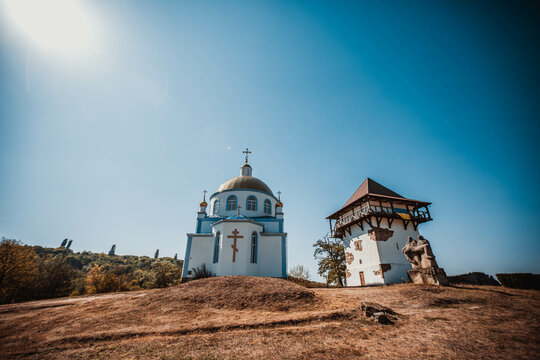lue Church and Old Tower in an open air nature reserve. Busha village. Ukraine