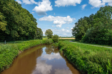 Natural reflections at the river Demer around Aarschot, Flanders, Belgium