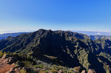 Mountain range under clear blue sky, Madeira Island, Portugal