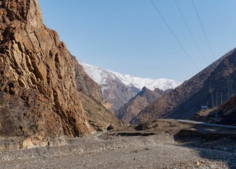Scenic view of an arid landscape with mountains near the Nepal-Tibet, China border.