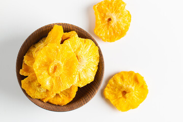 Dried pineapple in a bowl. Dried fruits. 