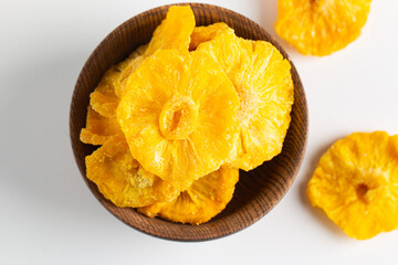 Dried pineapple in a bowl. Dried fruits. 