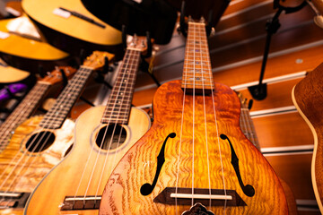 Fototapeta premium Closeup of guitars in store