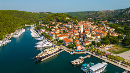 An aerial view of Skradin, a charming town near Krka National Park in Croatia. Nestled along the...
