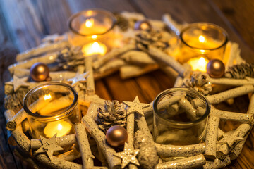 white advent christmas wreath with candles