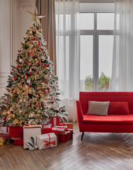 Christmas-tree decoration, gifts and ornament in a living room with modern furniture, red sofa, wooden floor and cozy atmosphere