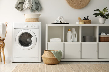 Washing machine, towels and detergents in laundry room
