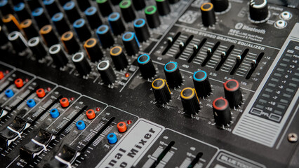 Jakarta, Indonesia 9th September 2024 ; music equipment in party venue. Music mixer with buttons...