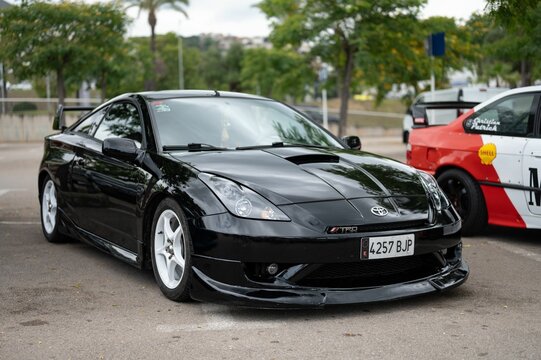 seventh generation Toyota Celica T230, 2000-2006, black with white wheels