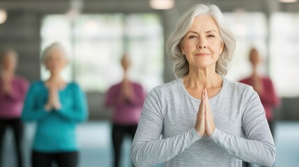 Senior woman practicing standing balance exercises in a wellness class, elderly balance wellness, fall prevention and fitness