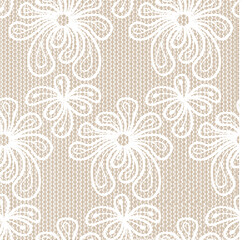 A repeating pattern of small dots creating an abstract design on a white background.