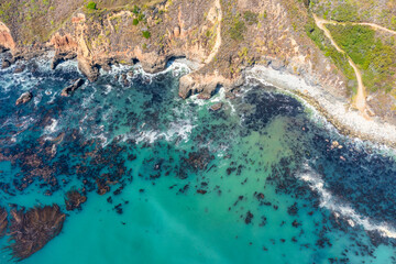 Beautiful landscape of Pacific Ocean coast along Highway 1 and Big Sur, aerial view, sunset, sunrise, fog. Concept, travel, vacation, weekend