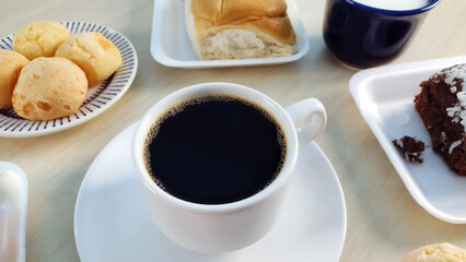 Cup of coffee on the breakfast table.
