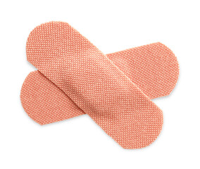 Medical adhesive bandages isolated on white, top view
