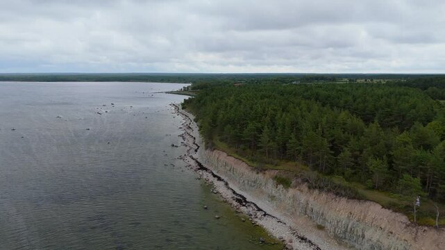 Aerial Video Panga Coastal Cliff and Lighthouse, Northern Shore of Saaremaa Island Near Kuressaare, Baltic Sea. Saaremaa, Estonia. 4K Panoramic Aerial Video of The Panga Cliffs