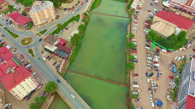 Aerial view a city with a river.