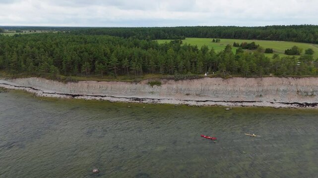 Aerial Video Panga Coastal Cliff and Lighthouse, Northern Shore of Saaremaa Island Near Kuressaare, Baltic Sea. Saaremaa, Estonia. 4K Panoramic Aerial Video of The Panga Cliffs