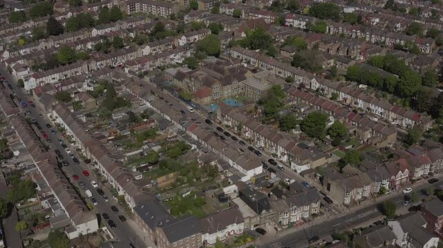 Aerial view of residential neighborhood and Tottenham Hotspur stadium in London, UK