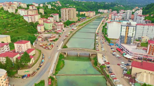 Aerial view a city with a river.