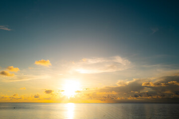 Sunrise sea on tropical beach. Landscape of beautiful beach. Beautiful sunset at sea. Ocean sunset on sky background with colorful clouds. Calm sea with sunset sky. Ocean and sky background.