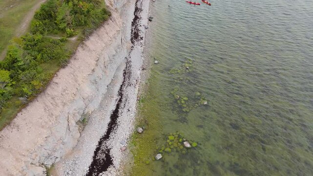 Aerial Video Panga Coastal Cliff and Lighthouse, Northern Shore of Saaremaa Island Near Kuressaare, Baltic Sea. Saaremaa, Estonia. 4K Panoramic Aerial Video of The Panga Cliffs