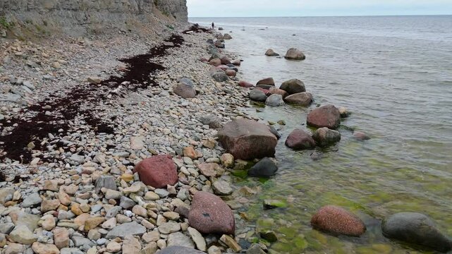 Aerial Video Panga Coastal Cliff and Lighthouse, Northern Shore of Saaremaa Island Near Kuressaare, Baltic Sea. Saaremaa, Estonia. 4K Panoramic Aerial Video of The Panga Cliffs
