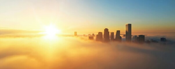 Golden sunrise illuminating a city skyline emerging from the fog, creating a serene and majestic atmosphere.