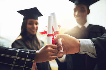 People, students and hands with certificate for graduation, celebration or qualification together...