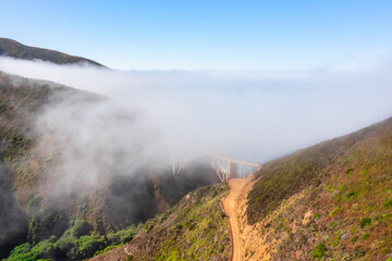 Beautiful landscape of Pacific Ocean coast along Highway 1 and Big Sur, aerial view, sunset, sunrise, fog. Concept, travel, vacation, weekend