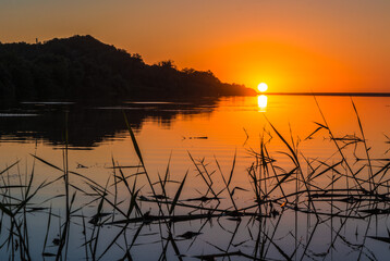 African river reflection sunset, Beautiful view of a river surrounded by trees in the forest, Big River in Jijel Prefecture in Algeria, Travel or outdoor in North Africa , Nobody, Lake africa