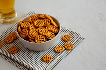 Organic Dry Waffle Pretzels in a Bowl, side view. Copy space.