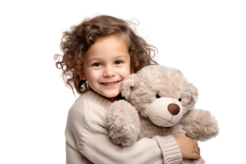 A smiling child holding a large stuffed animal, hugging it tightly while wearing a cozy sweater isolated on white background